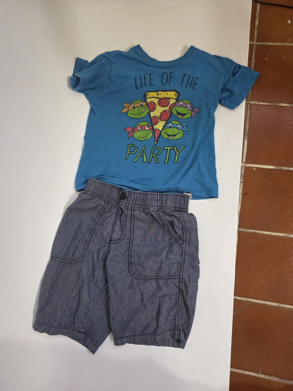 Kids T-Shirt featuring  Ninja Turtle Pizza Graphic and  Blue Shorts Set.